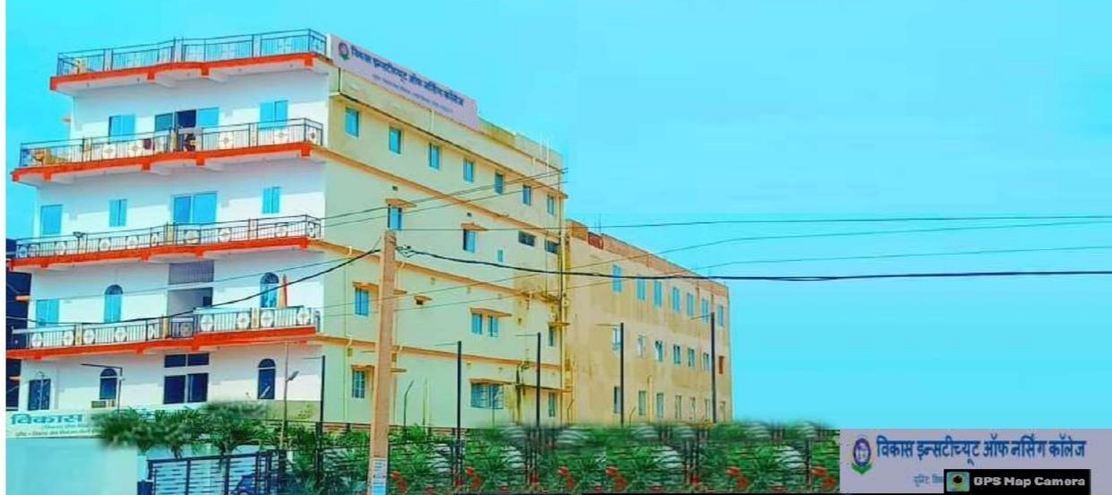 College campus building with lawn and trees